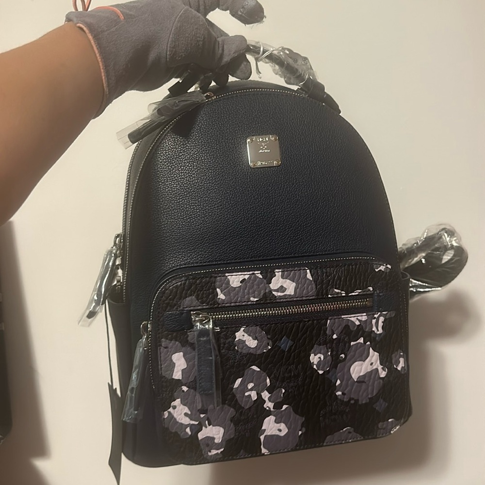 100 authentic MCM backpack brand new never use